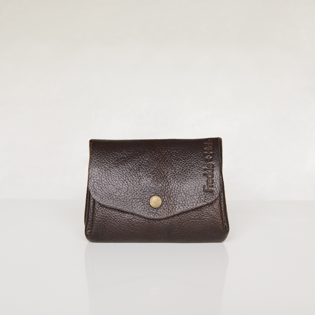 Dark brown leather wallet with antique brass popper on curved front flap