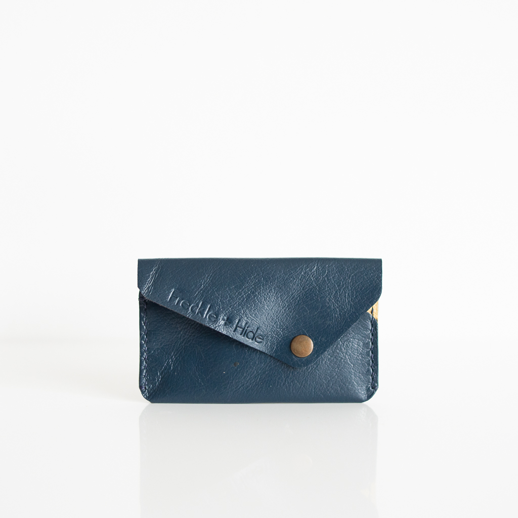 Upcycled leather wallet in blue and yellow with brass popper